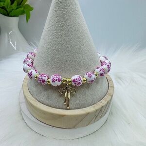 Pink Chinese-Style Ceramic Floral Beaded Stretch Bracelet w/ Bow Charm